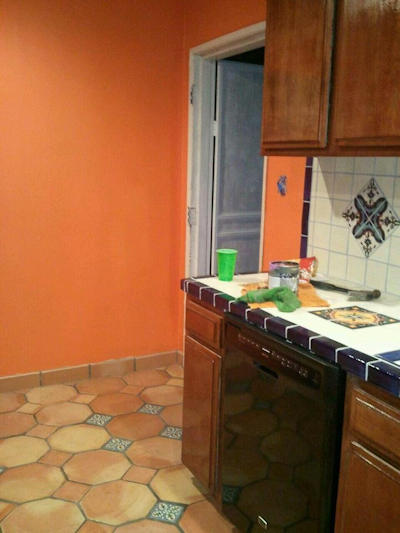 terracotta flooring in kitchen and bathrooms